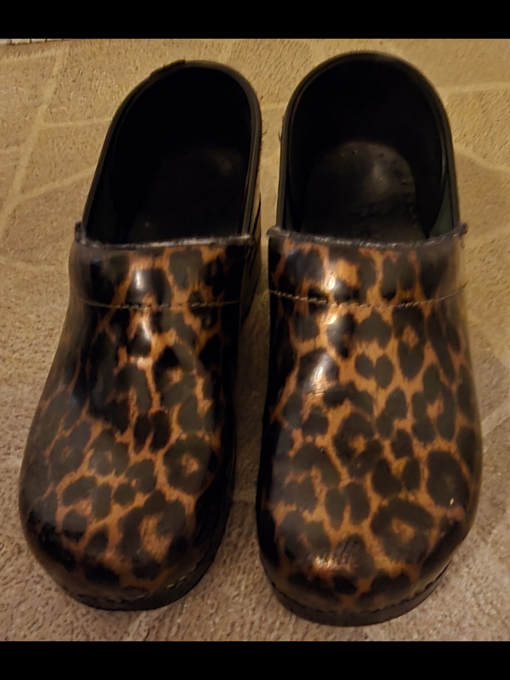 Dansko Leopard Print Clogs in Brown and Black